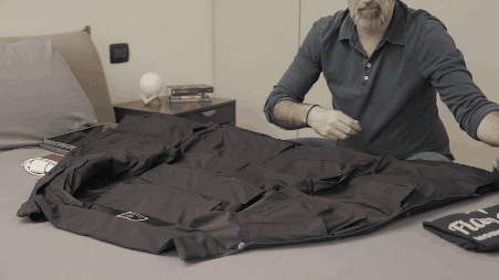 unisex travel jacket worn by both men and women at airport